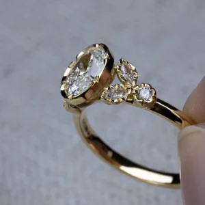 Natalie Perry Jewellery, Oval Diamond Floral Shoulders Engagement Ring (3)